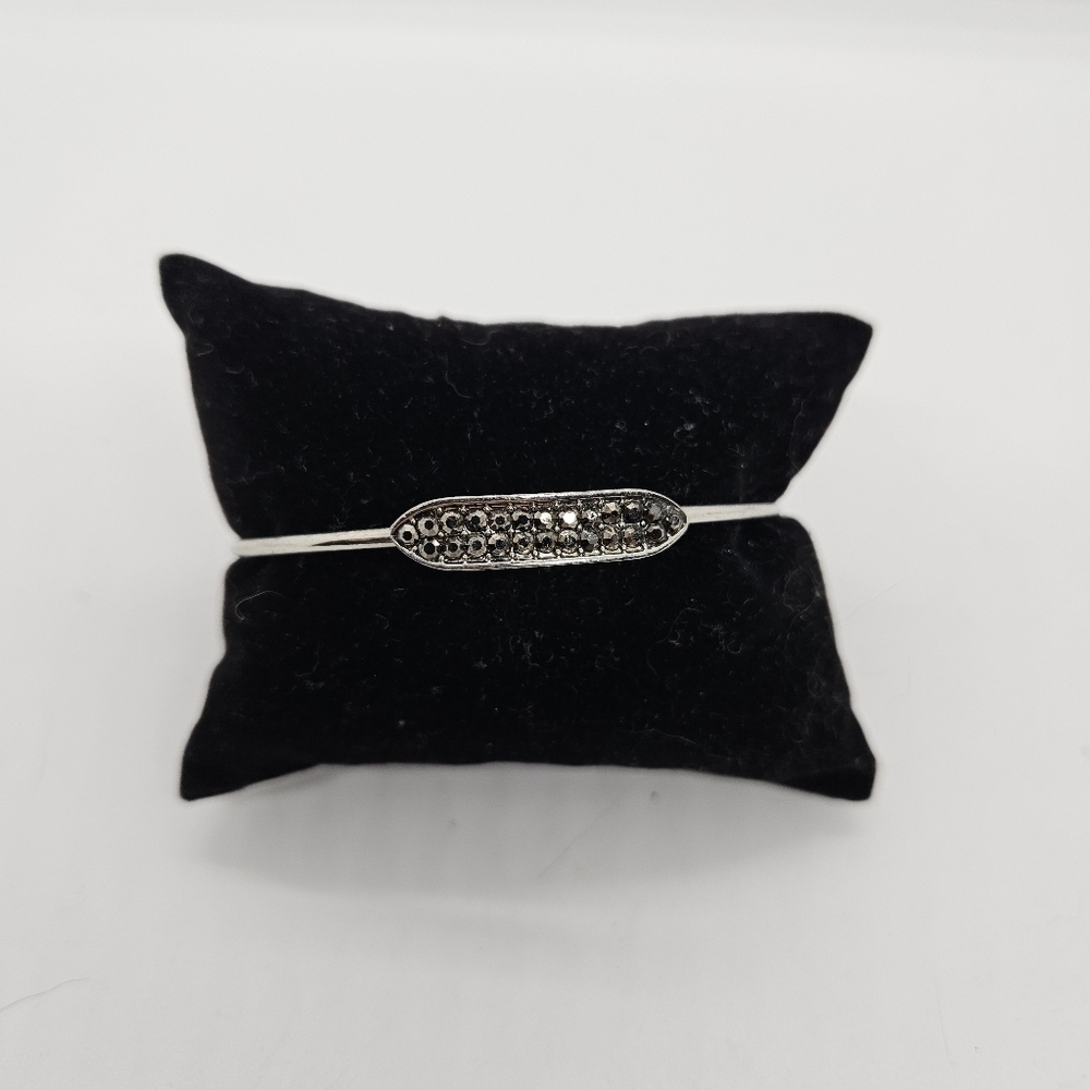 silver tone cuff bracelet with gunmetal gray rhinestones
